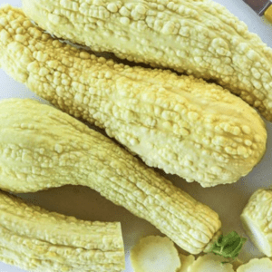 Fresh bitter gourds with a textured surface.